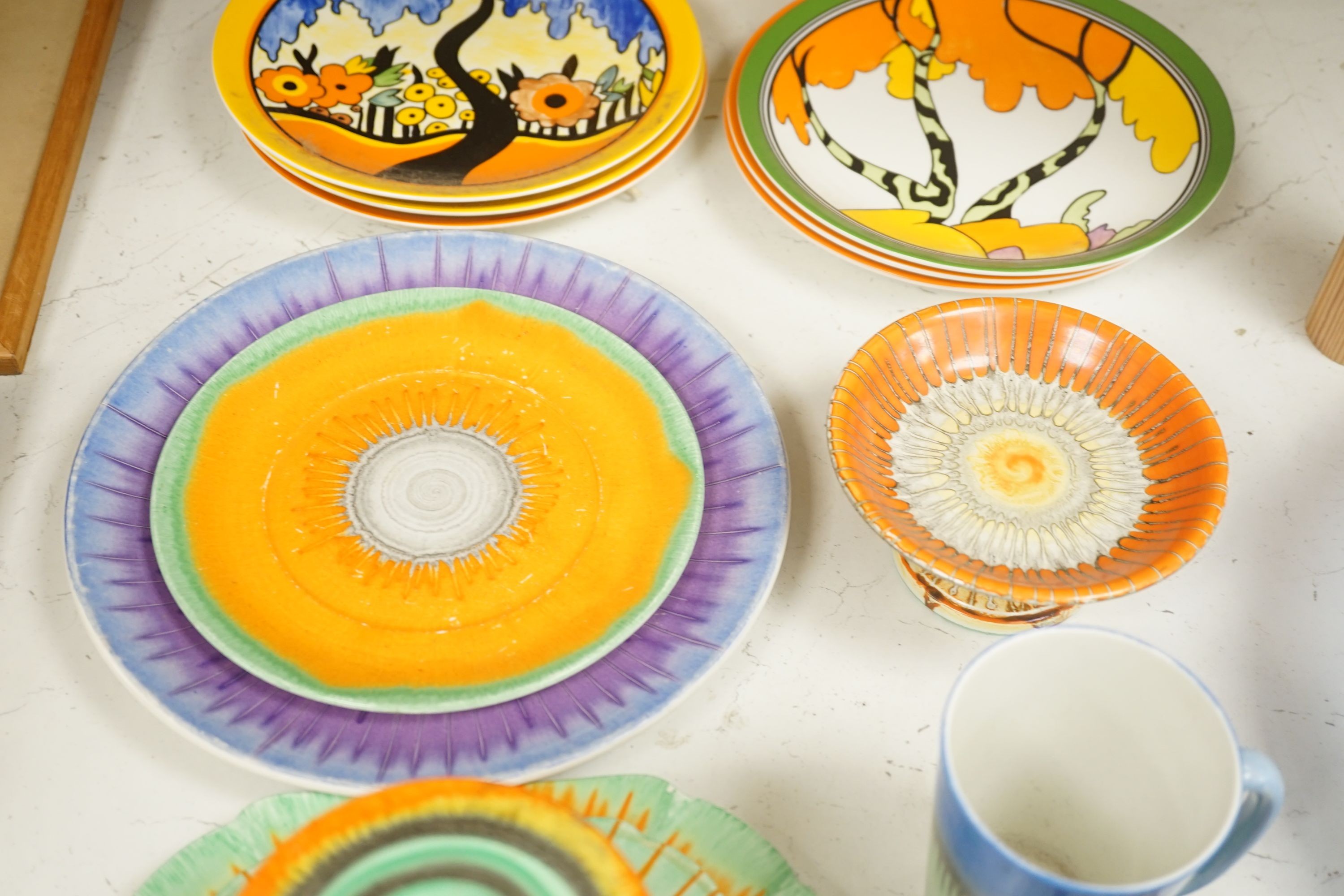 A quantity of Shelley dripware and six Wedgwood reproduction Clarice Cliff plates, largest plate diameter 24cm